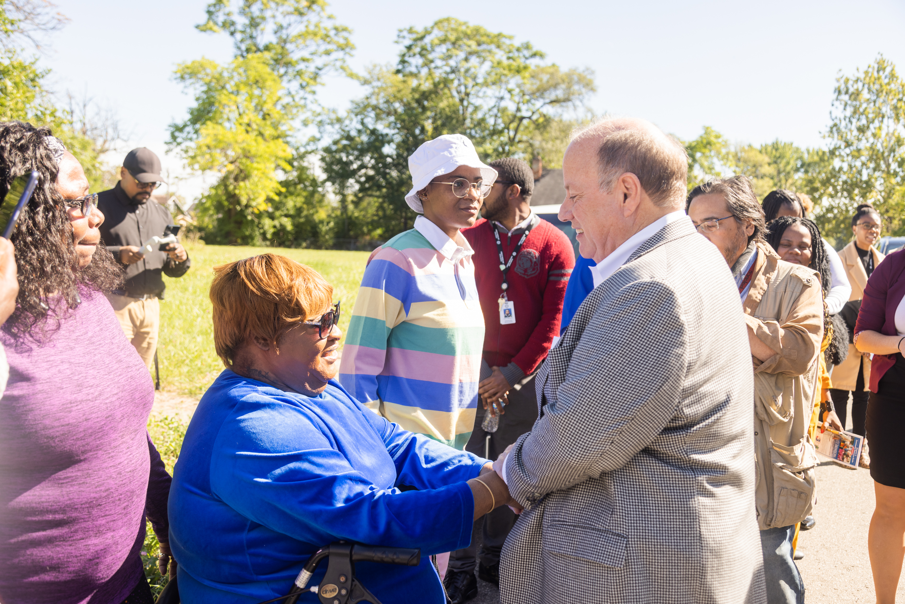 Renew Detroit Phase 1 recipient Samela Dean with Mayor Duggan